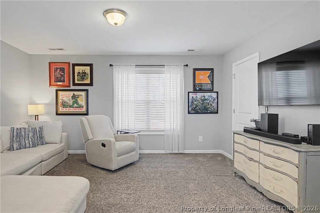 143 Ledgebrook Lane Raeford, NC 28376 - Photo 45 of 50 a bedroom with furniture and a window