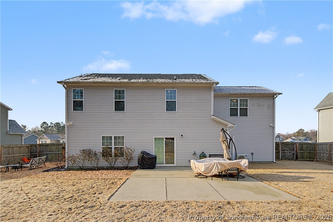 143 Ledgebrook Lane Raeford, NC 28376 - Photo 47 of 50 a front view of a house with a patio
