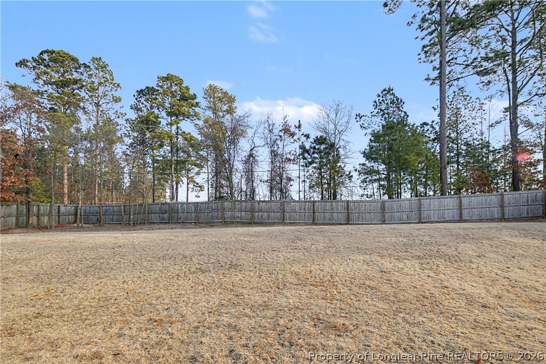 143 Ledgebrook Lane Raeford, NC 28376 - Photo 50 of 50 a view of patio with a yard