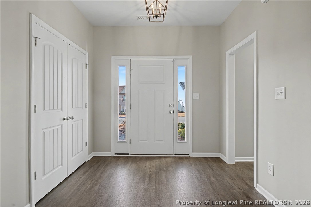 143 Ledgebrook Lane Raeford, NC 28376 - Photo 6 of 50 an empty room with wooden floor