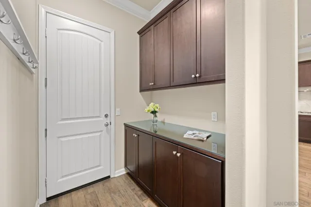 a kitchen with a sink and cabinets