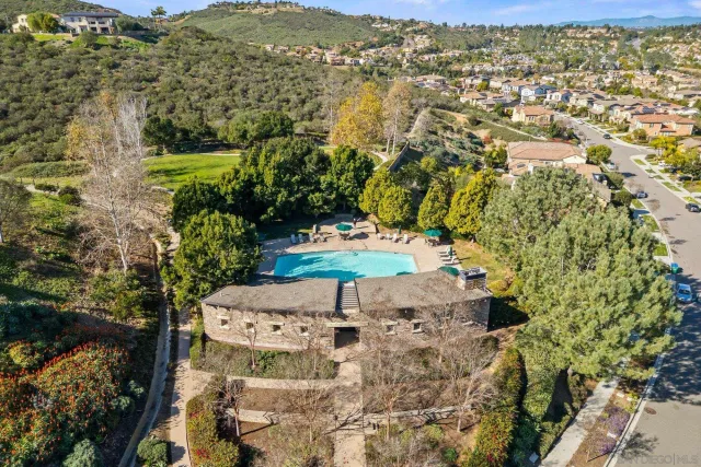 an aerial view of a house having yard