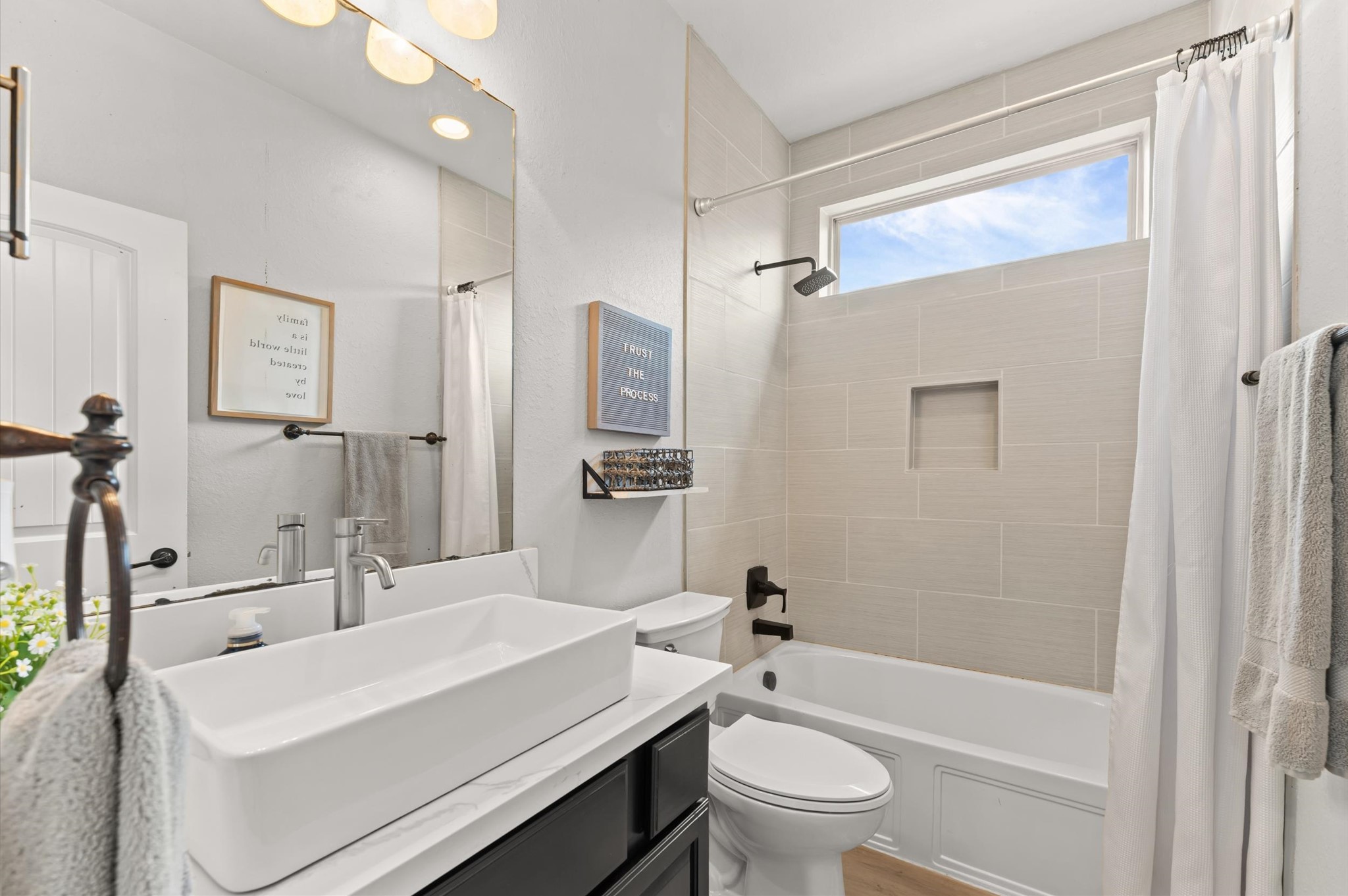 14016 Savannah Landing Lane Rosharon, TX 77583 - Photo 24 of 49 a bathroom with a sink a toilet a mirror and shower