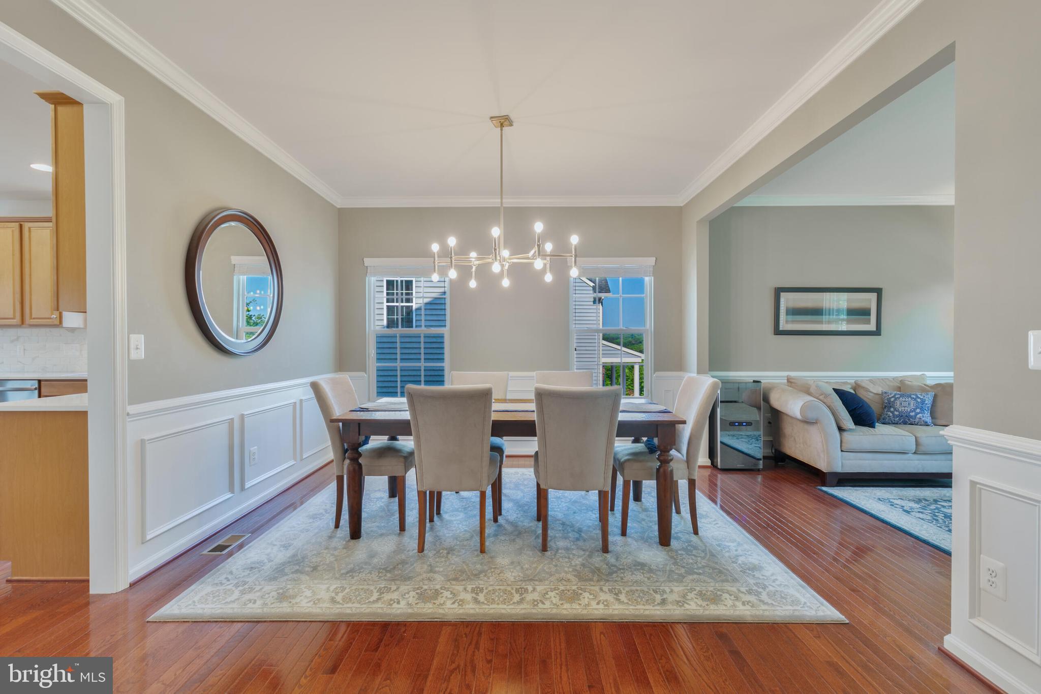 40652 Banshee Drive Leesburg, VA 20175 - Photo 11 of 51 a view of a dining room with furniture and a chandelier