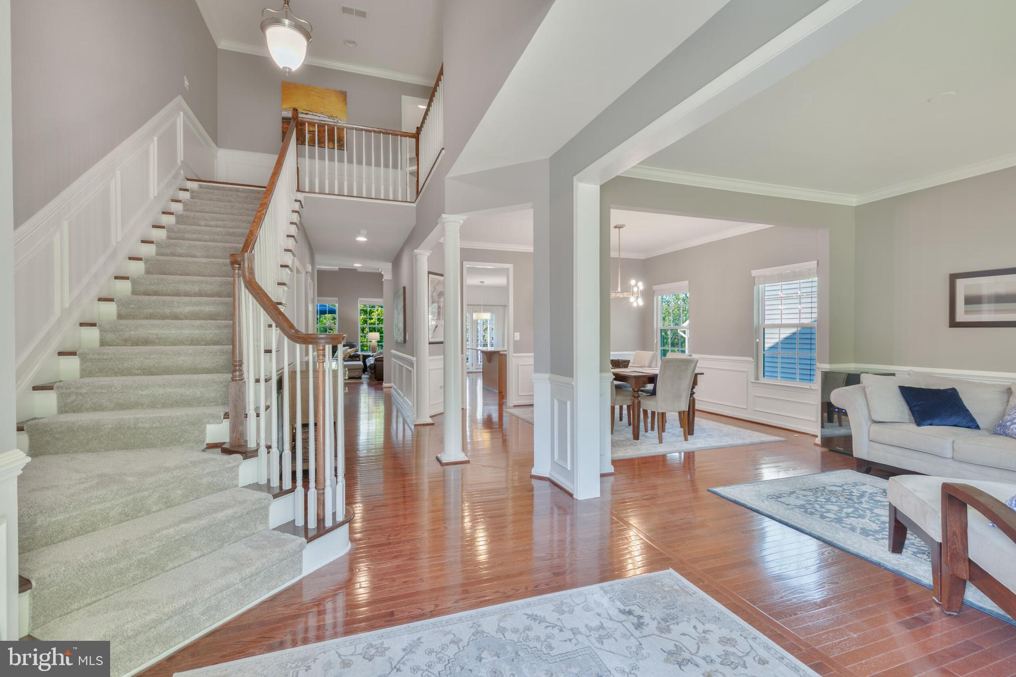 40652 Banshee Drive Leesburg, VA 20175 - Photo 2 of 51 a living room with furniture and a wooden floor