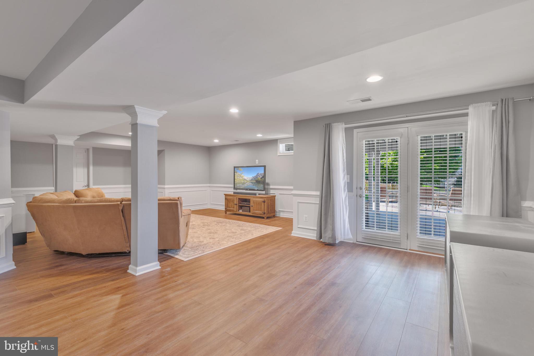 40652 Banshee Drive Leesburg, VA 20175 - Photo 35 of 51 a view of a kitchen with wooden floor and a sink