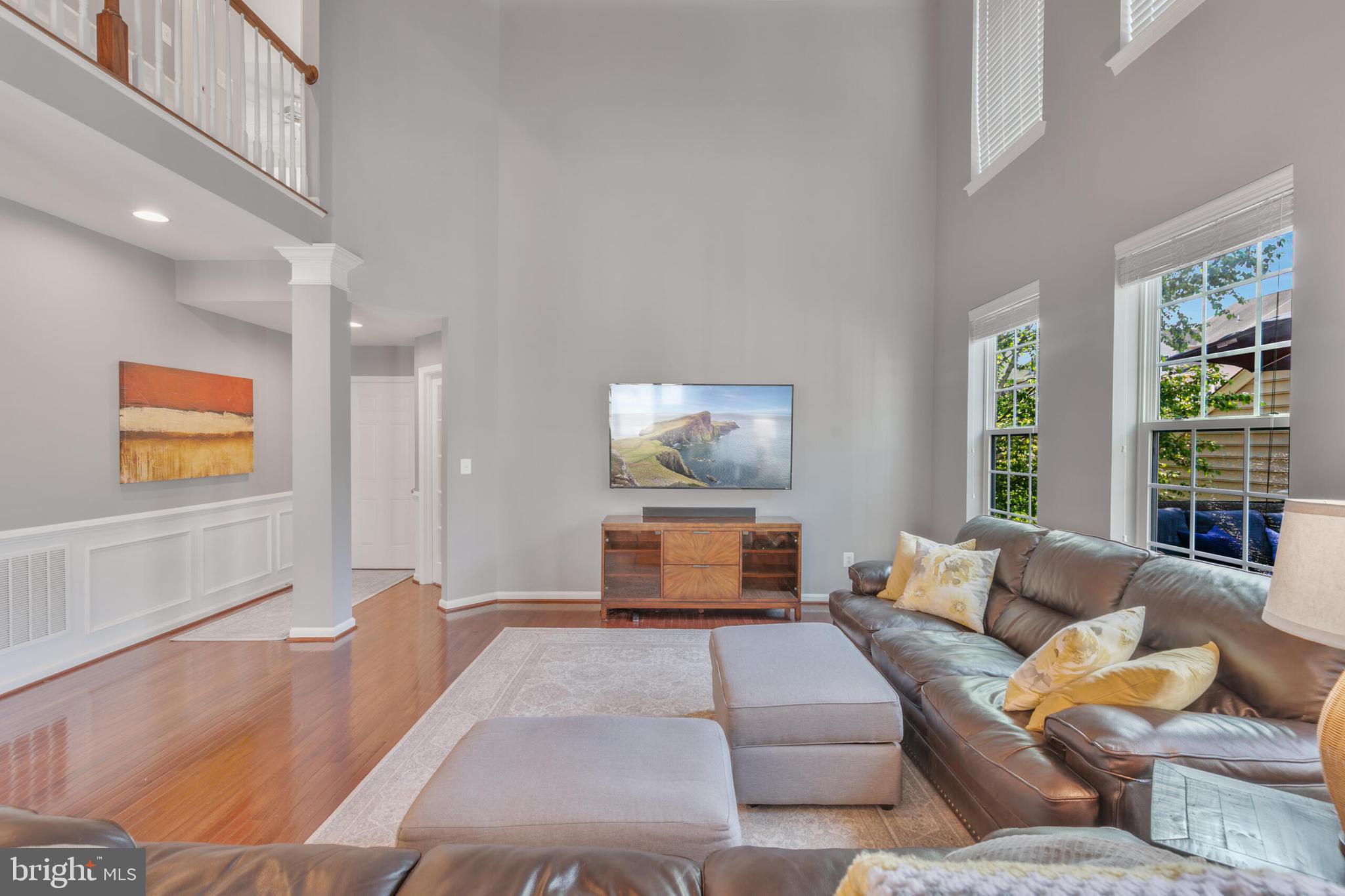 40652 Banshee Drive Leesburg, VA 20175 - Photo 6 of 51 a living room with furniture and a couch