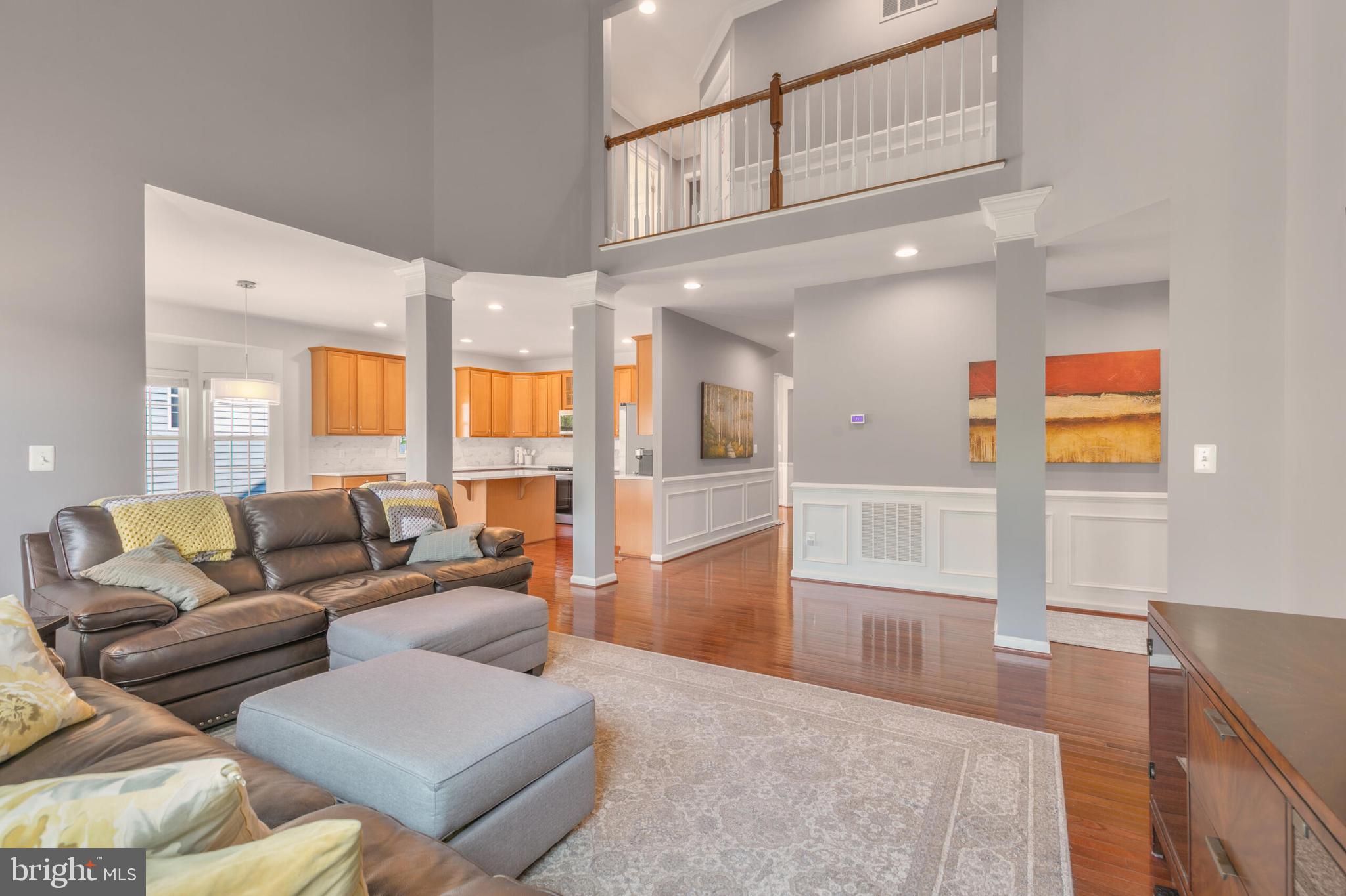 40652 Banshee Drive Leesburg, VA 20175 - Photo 7 of 51 a living room with furniture and a large window