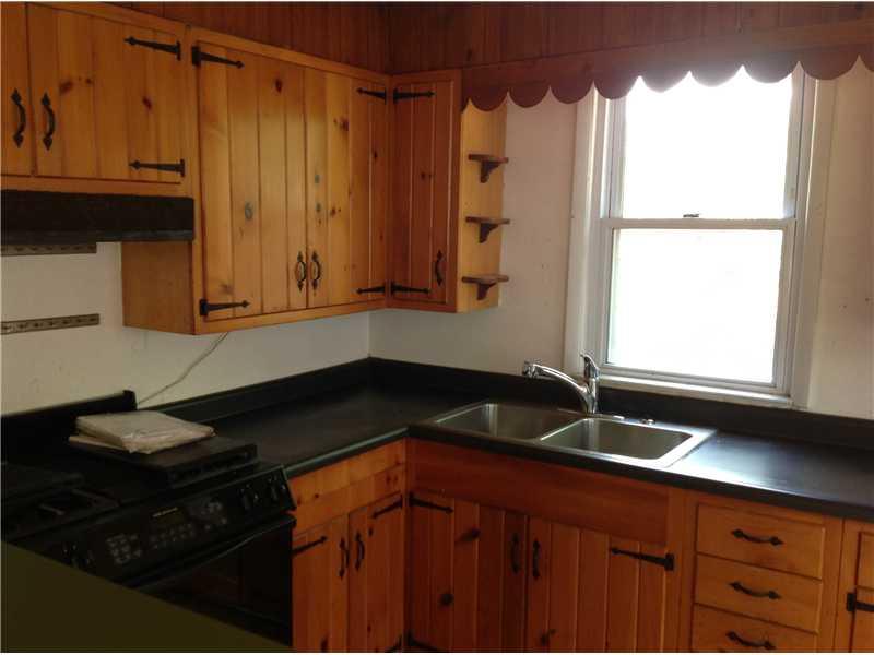 741 South State Line Road Sharon, PA 16146 - Photo 3 of 12 Kitchen. Knotty Pine cabinets are featured in the kitchen.