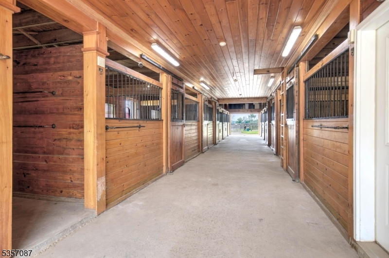 338 Rileyville Road Ringoes, NJ 08551 - Photo 12 of 33 a view of a hallway with wooden walls