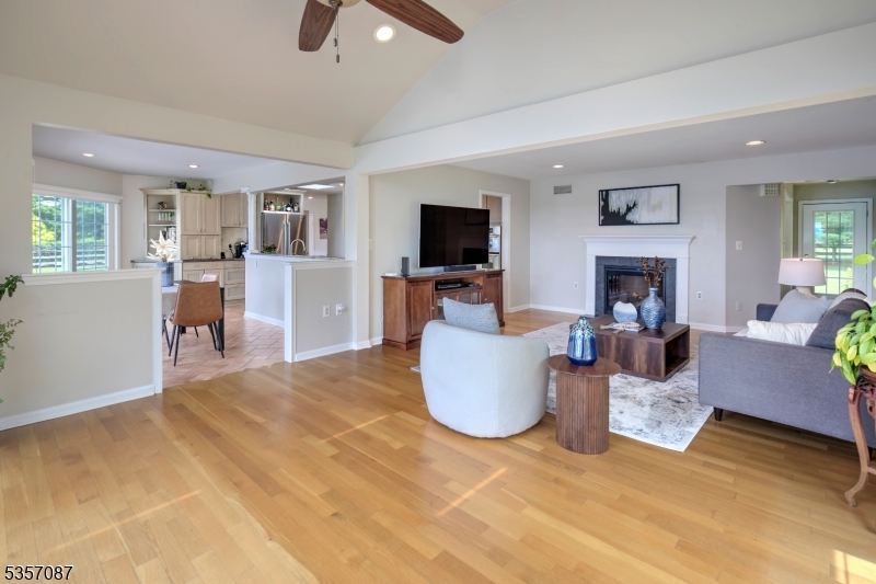 338 Rileyville Road Ringoes, NJ 08551 - Photo 20 of 33 a living room with furniture and a flat screen tv