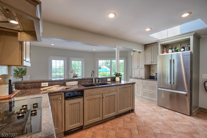 338 Rileyville Road Ringoes, NJ 08551 - Photo 22 of 33 a kitchen with granite countertop a sink stainless steel appliances and cabinets