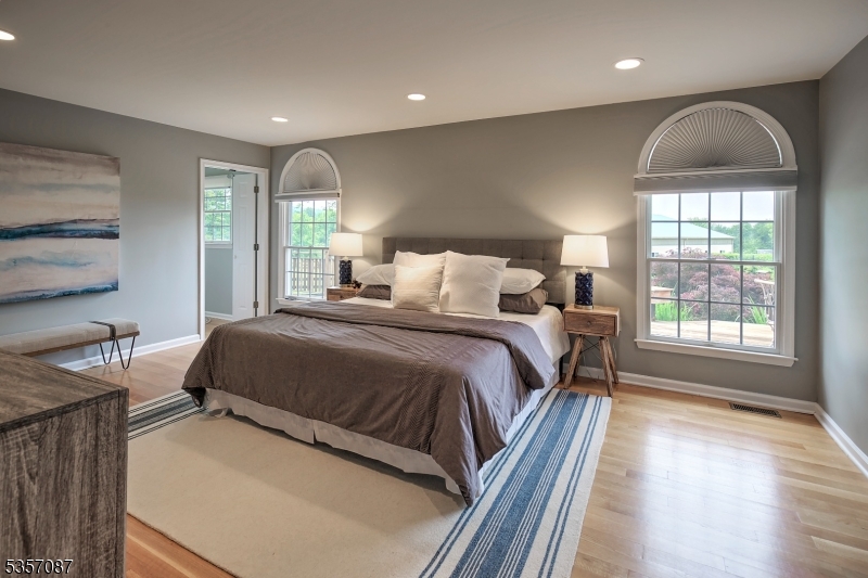 338 Rileyville Road Ringoes, NJ 08551 - Photo 27 of 33 a bedroom with a large bed and a large window