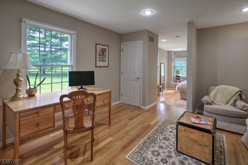 338 Rileyville Road Ringoes, NJ 08551 - Photo 30 of 33 a living room with furniture window and a flat screen tv