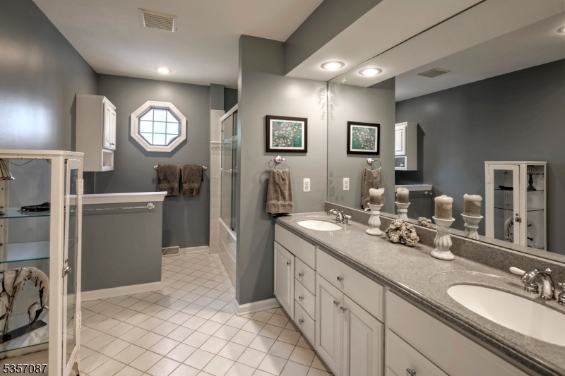 338 Rileyville Road Ringoes, NJ 08551 - Photo 31 of 33 a spacious bathroom with a double vanity sink and a mirror