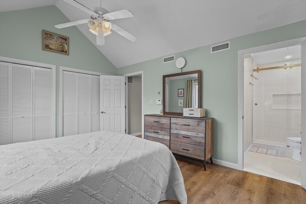 37 Constitution Lane, Unit 12 Danvers, MA 01923 - Photo 18 of 38 a bedroom with a bed and a dresser