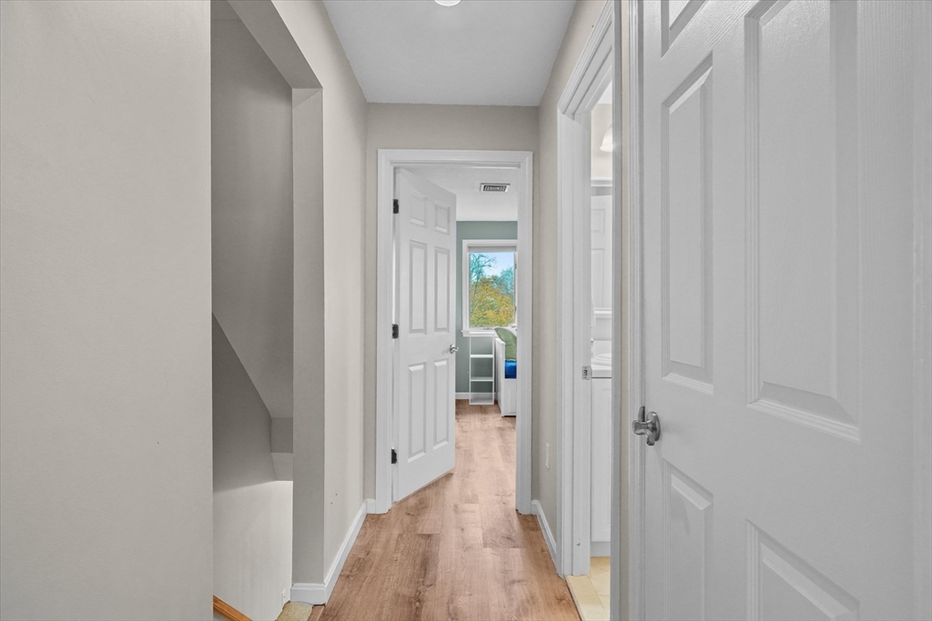 37 Constitution Lane, Unit 12 Danvers, MA 01923 - Photo 21 of 38 a view of a bathroom from the hallway