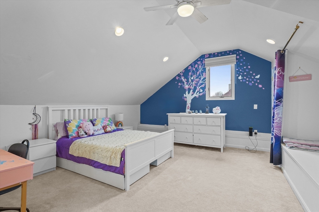 37 Constitution Lane, Unit 12 Danvers, MA 01923 - Photo 27 of 38 a bedroom with bed and window