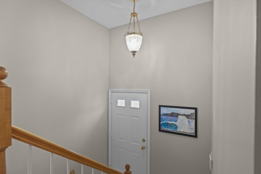 37 Constitution Lane, Unit 12 Danvers, MA 01923 - Photo 28 of 38 a view of a hallway with front door