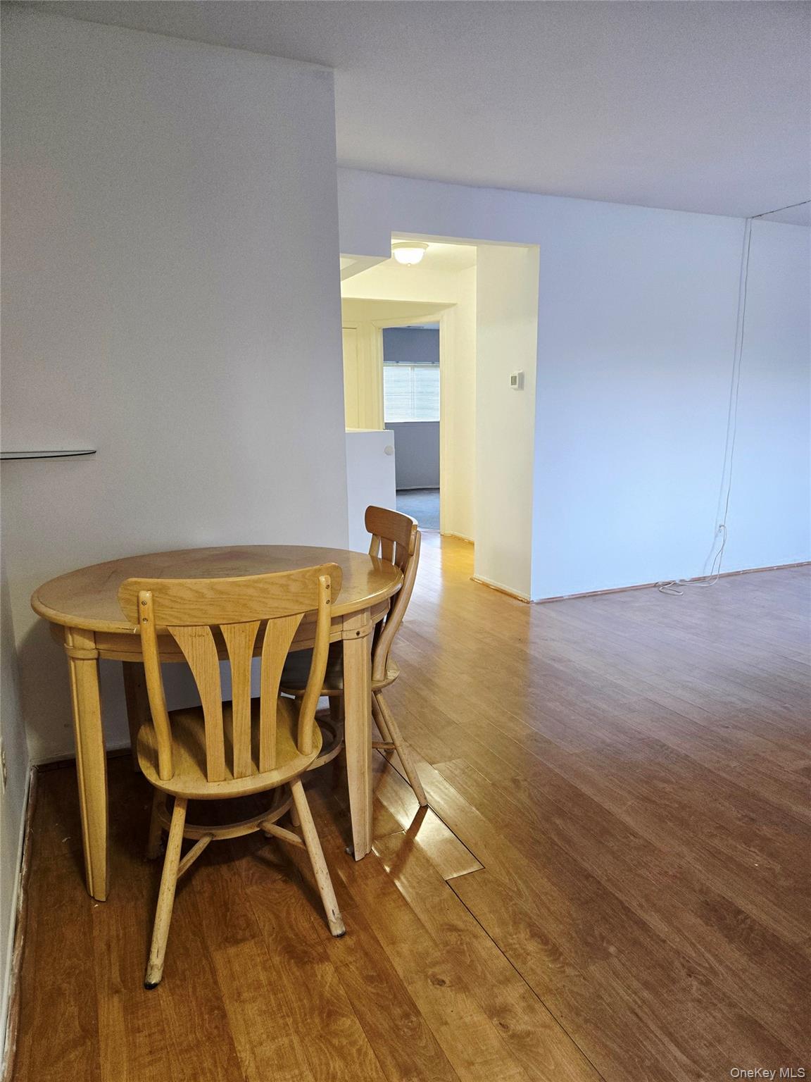 79 Pointe Circle South, Unit 79 Coram, NY 11727 - Photo 3 of 39 Dining space with wood finished floors