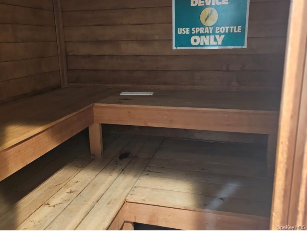 79 Pointe Circle South, Unit 79 Coram, NY 11727 - Photo 38 of 39 Sauna featuring wooden walls