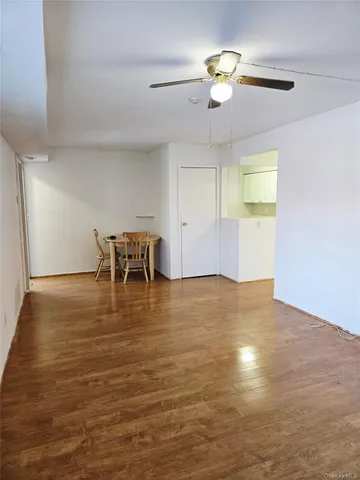 a view of dining room with furniture and chandelier