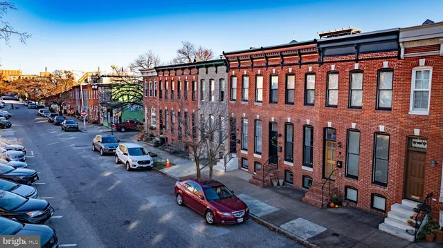 a view of a street with cars