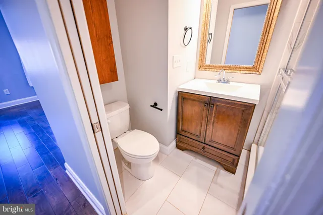 a bathroom with a toilet and a sink