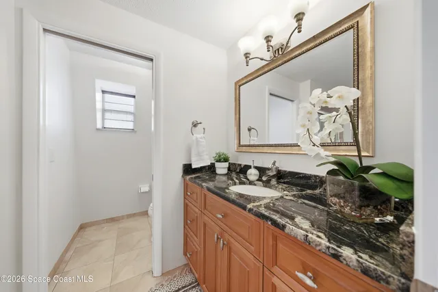 a bathroom with a tub and shower