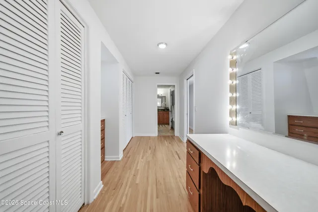 a view of a swimming pool with a yard