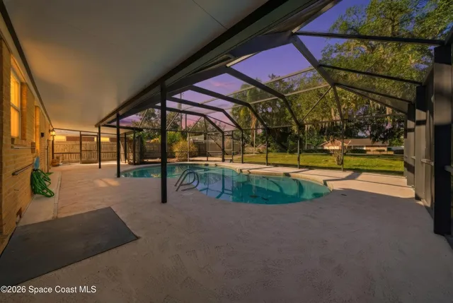 a view of a park with large trees