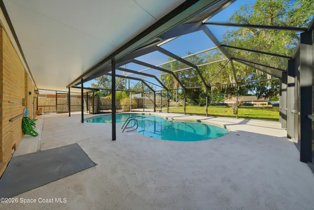 a view of a park with large trees