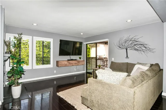 a bedroom with a bed and dresser