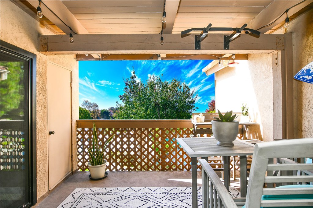 16551 Grunion Lane, Unit 204 Huntington Beach, CA 92649 - Photo 2 of 45 a outdoor view with a sitting space