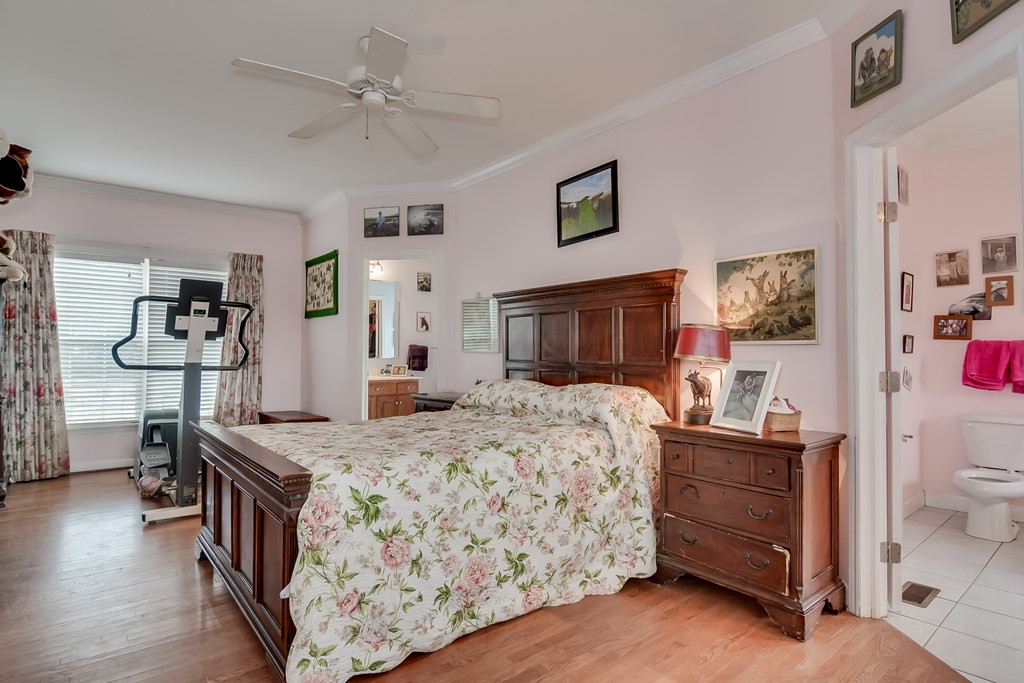 4069 Wagener Road Aiken, SC 29805 - Photo 16 of 33 a bedroom with a bed and a dresser in it