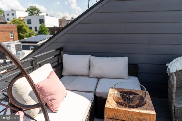 a backyard of a house with seating space