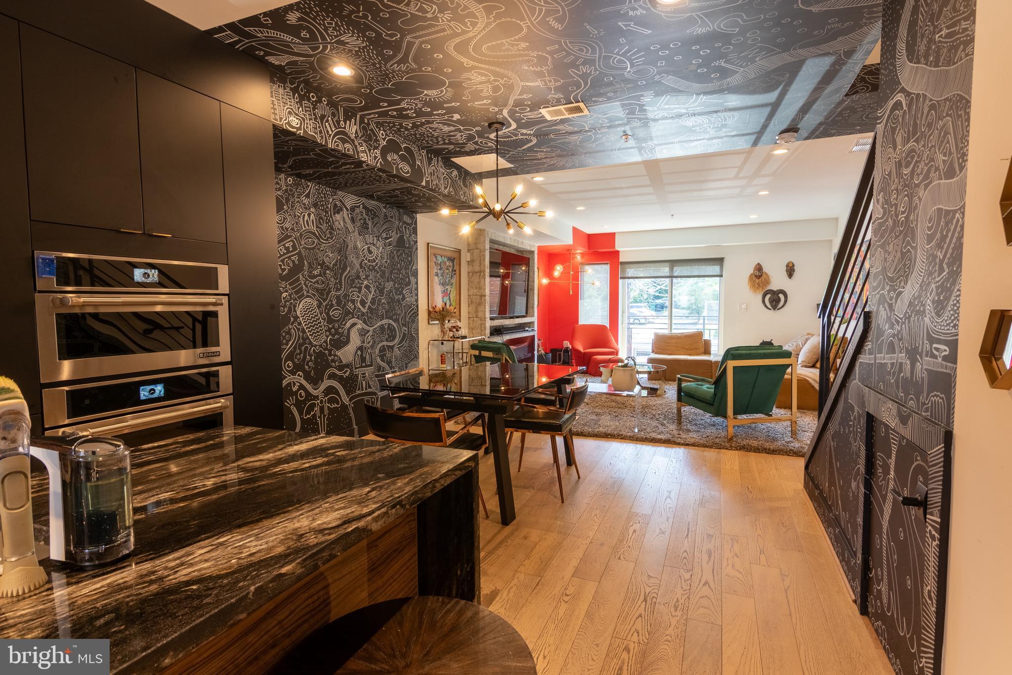1631 Montello Avenue Northeast, Unit PH1 Washington, DC 20002 - Photo 9 of 51 a view of a chairs and table in a room