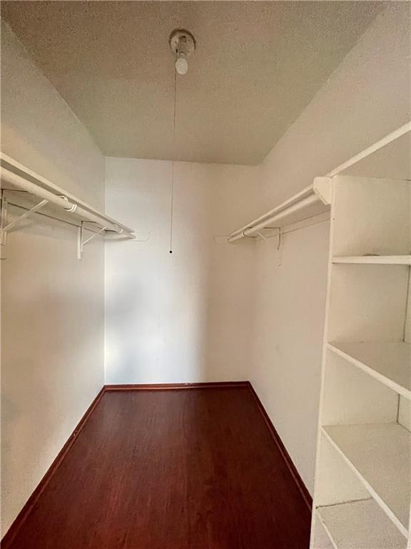 16927 Whitebrush Loop Austin, TX 78717 - Photo 11 of 28 a view of a room with wooden floor
