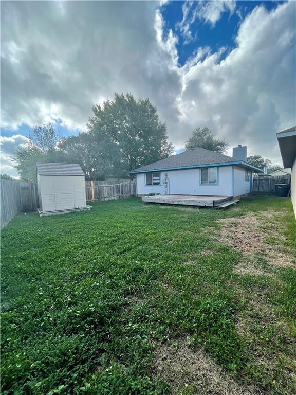 16927 Whitebrush Loop Austin, TX 78717 - Photo 17 of 28 a view of a backyard with a garden