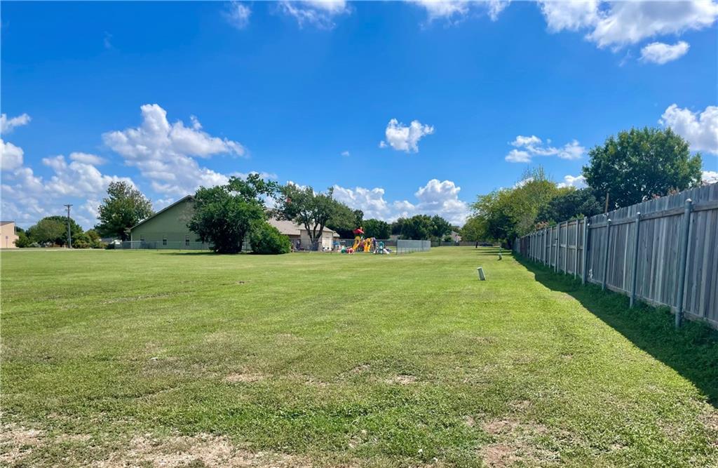 16927 Whitebrush Loop Austin, TX 78717 - Photo 19 of 28 a view of yard with swimming pool and green space