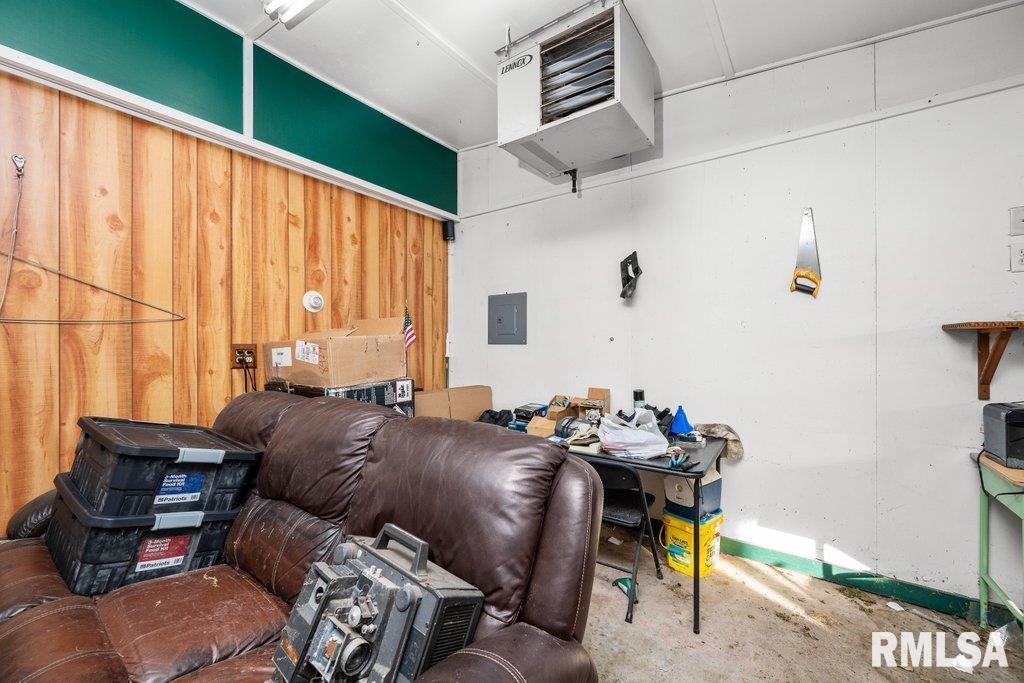 409 233rd Street Aledo, IL 61231 - Photo 26 of 45 a bed room with furniture and a window