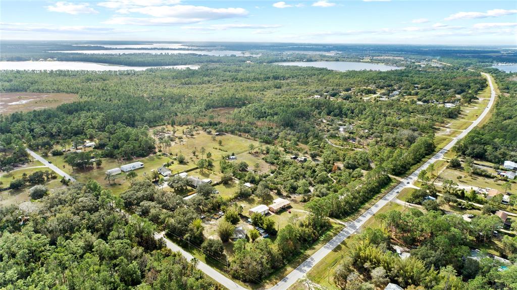 0 7th Street St. Cloud, FL 34771 - Photo 3 of 14 a view of a green field