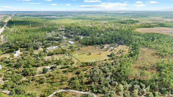 a view of a lake from a yard