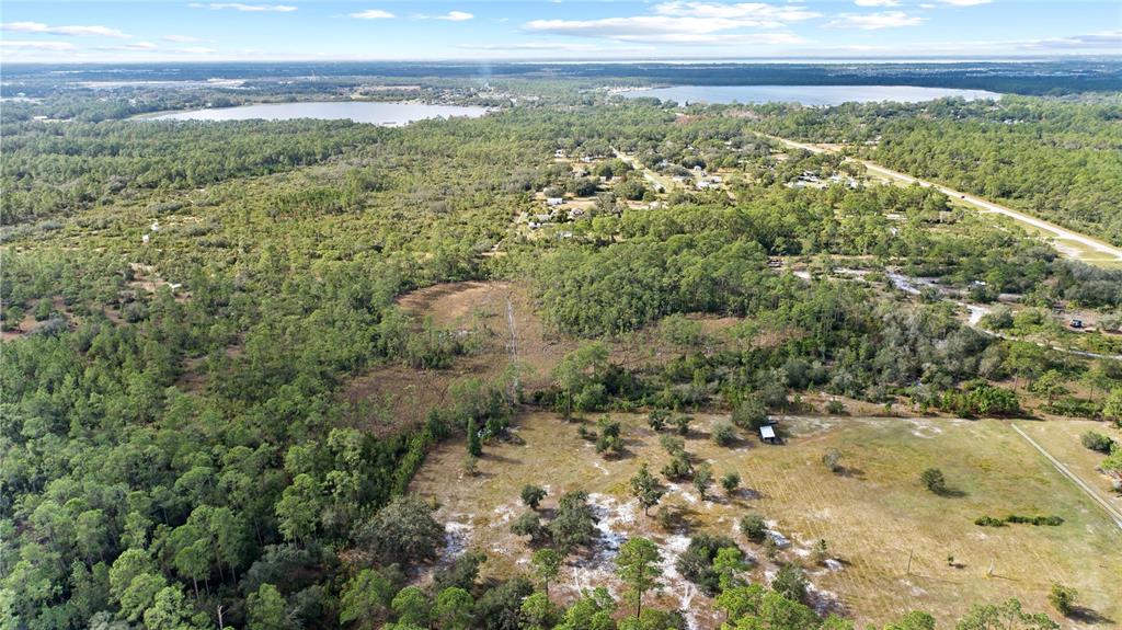 0 7th Street St. Cloud, FL 34771 - Photo 7 of 14 a view of a yard with an ocean view