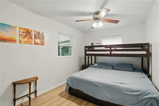 a bedroom with a bed and a hallway