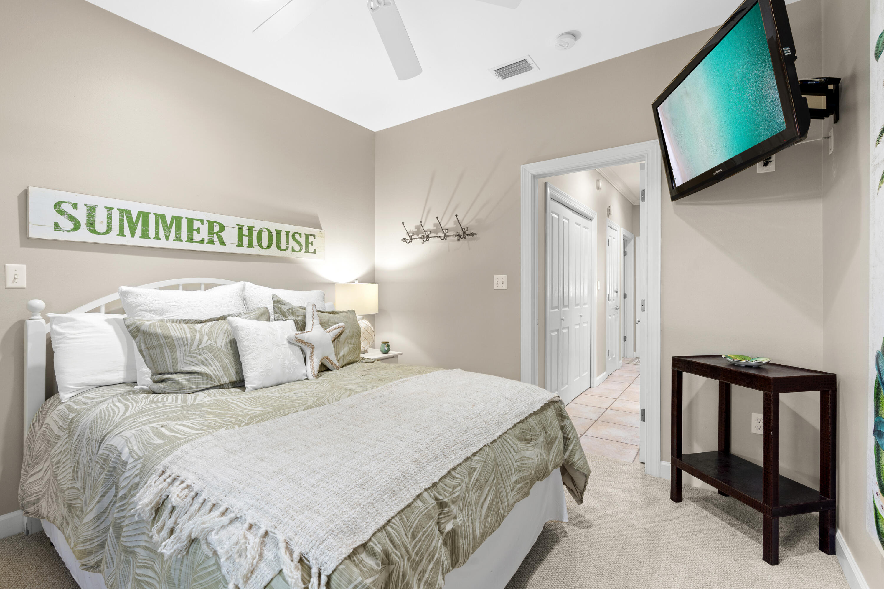 1108 Prestwick Place Miramar Beach, FL 32550 - Photo 27 of 47 a bedroom with a bed and a flat screen tv