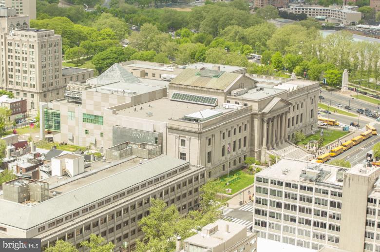 1222-26 Arch Street, Unit 507 Philadelphia, PA 19107 - Photo 20 of 22 a large building with a view of a big yard