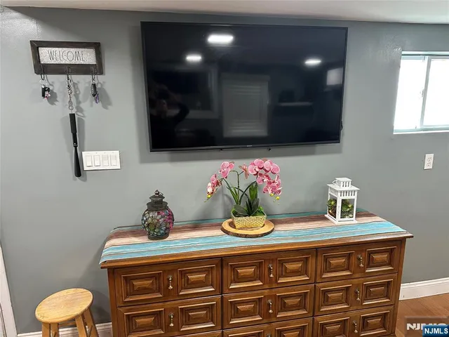 a bathroom with a sink a vanity and a mirror
