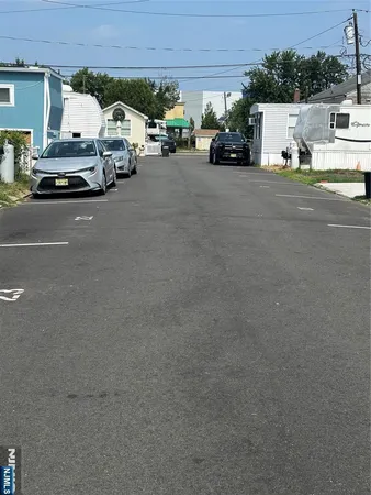 a car parked in front of a house