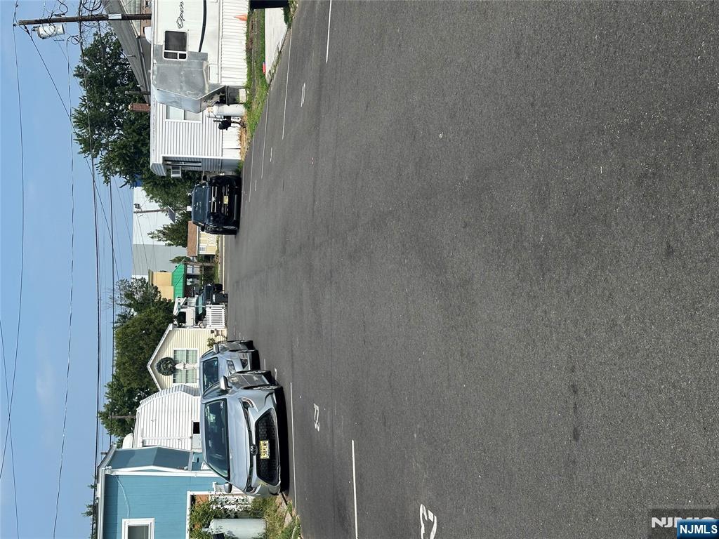 15 2nd Street Lodi, NJ 07644 - Photo 28 of 32 a view of street with parked cars